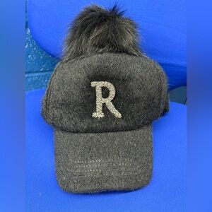 Elegant Black Furry Hat with Pom Pom